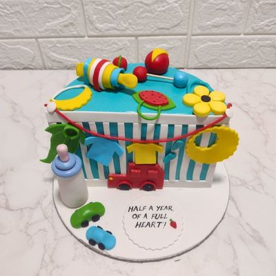 Baby Cot Half Birthday Theme cake