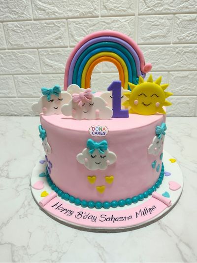 Cloudy Rainbow Theme Cake