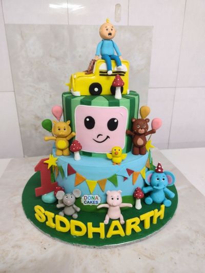 Cocomelon Boy And Bus Theme Cake